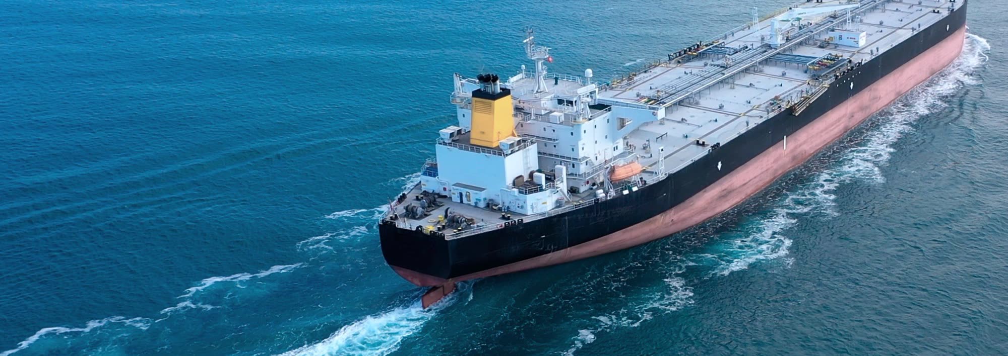 Aerial view of a tanker underway at sea